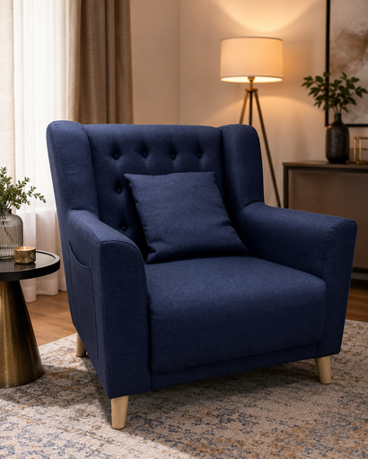 Fauteuil bleu marine capitonné avec coussin